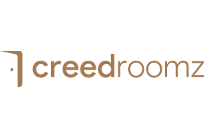 Creed Roomz logo in gold with a minimalist design
