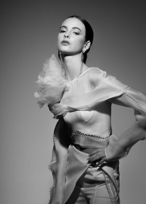 Dreamy and elegant portrayal of Aina in artistic lighting.